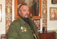 Представитель ПУ ФСБ РФ   наградил  медалью  священника Илию Березовского